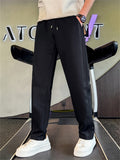 ‌Men's Loose Fit Elastic Waist Drawstring Striped Straight Leg Track Pants‌