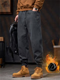 ‌Men's American Style Loose Fit Casual Jogger Pants with Button Details Pockets