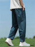 Men‘s Summer Loose Fit Drawstring Casual Jogger Pants with Buttons Details Cuff
